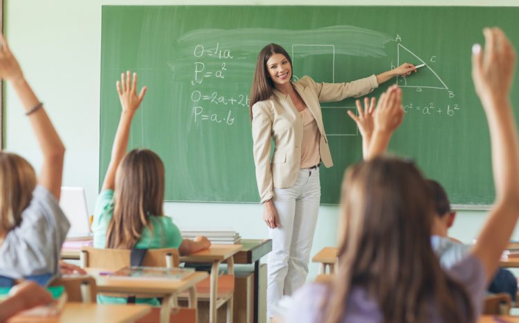 A math teacher teaching her students