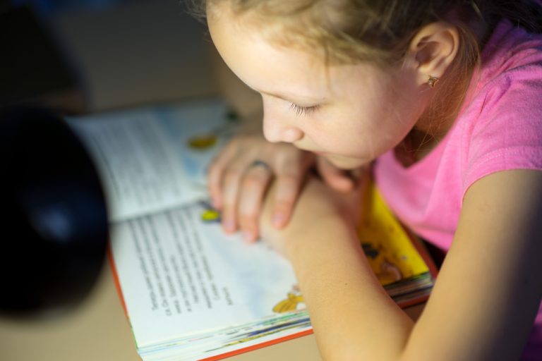 Girl reading at home