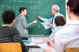 A teacher using explicit instruction for math