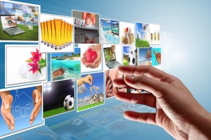 Hand reaching out to a variety of images