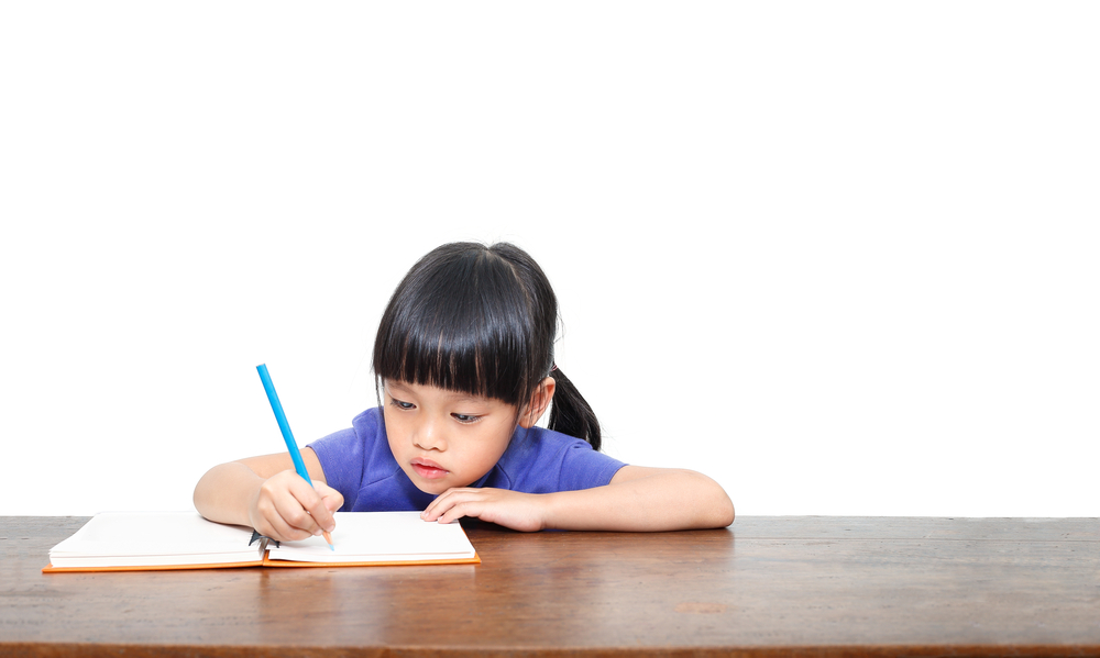 Image of a student writting
