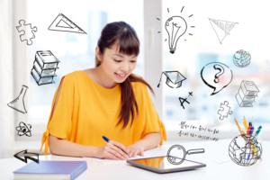 Image of a student Writing