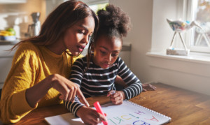 Image of a kid writing
